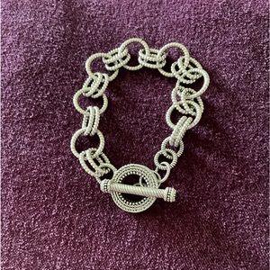 Judith Ripka Sterling silver link bracelet with toggle clasp.